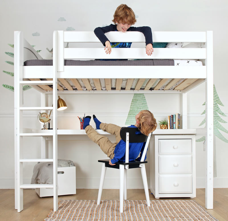 brothers hanging out on Maxtrix loft bed with desk in a white finish