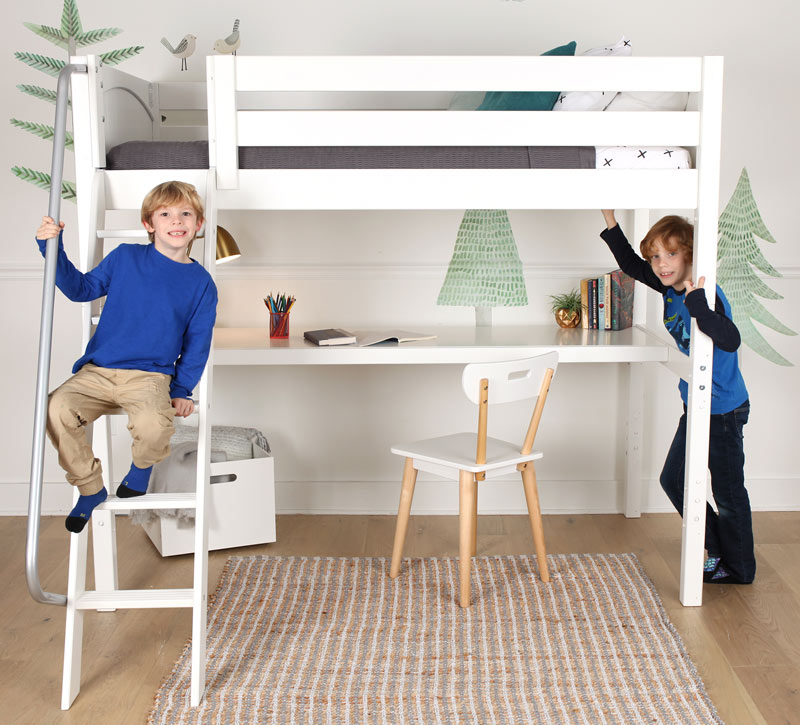 brothers hanging out on Maxtrix loft bed with desk below in a white finish