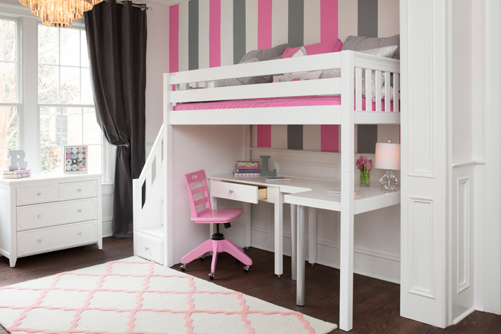 desk with pink chair below white Maxtrix loft bed with staircase