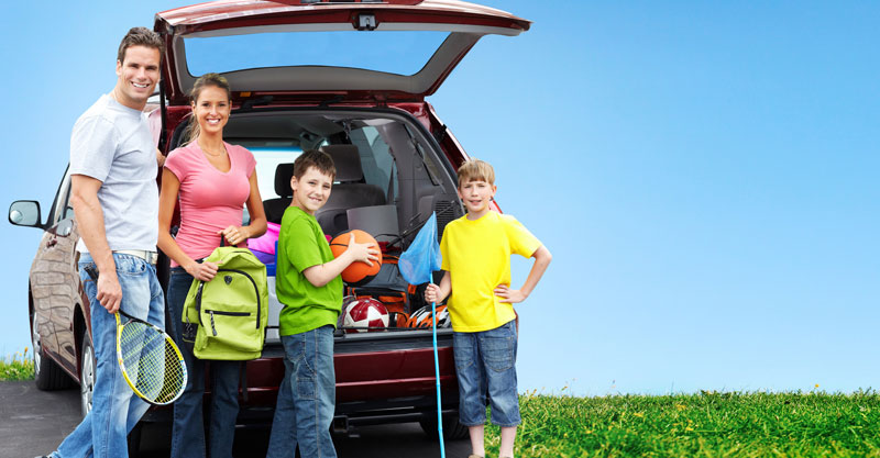 family with children enjoying their summer traveling