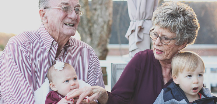 happy grandparents with their grandchildren