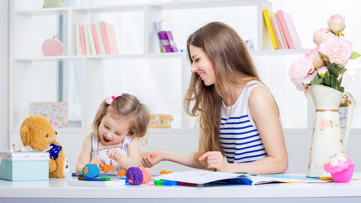 mother and daughter making things with craft dough