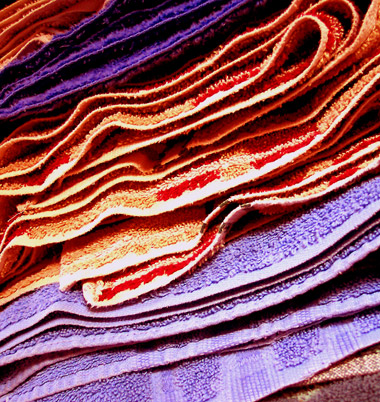 stack of brightly colored folded towels