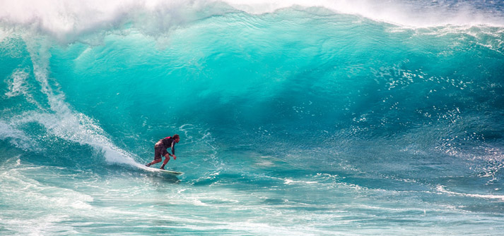 surfing a giant ocean wave