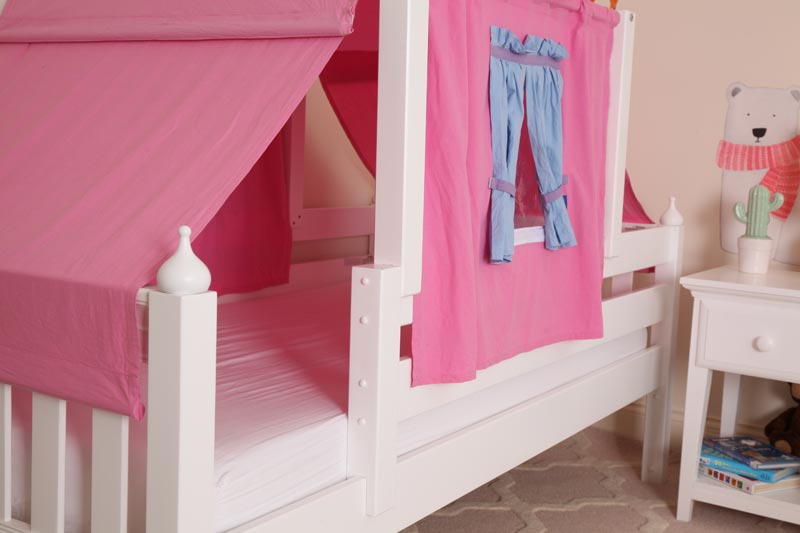 girls toddler bed with pink curtain and side rail