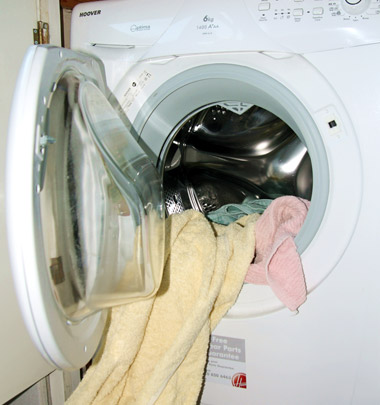 towels falling out of washing machine