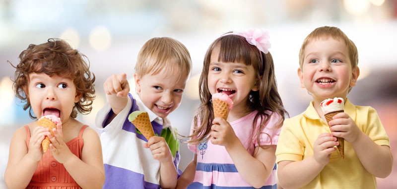 young children enjoying their ice cream cones